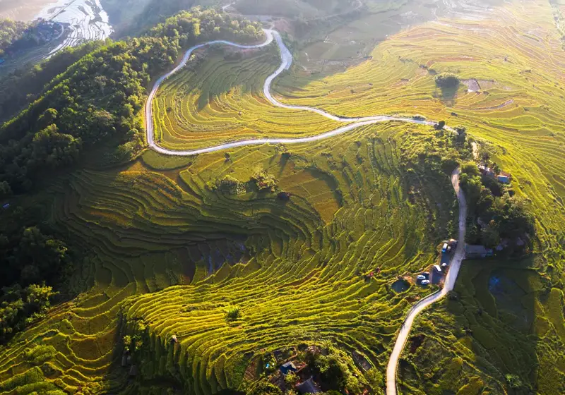 Sunrise over Pu Luong Nature Reserve with rice terraces and mountain valley view